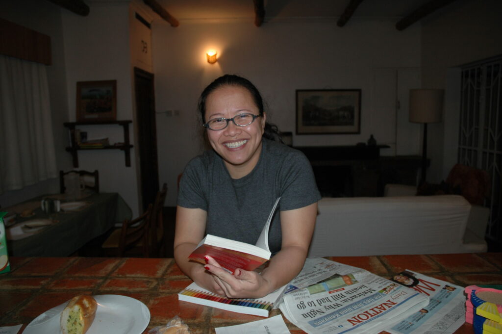 Reading by the kitchen counter at my second Tigoni house