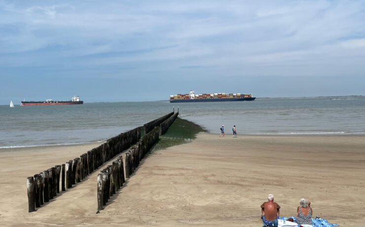 Old people sunbathing on a beach in Breskens, Zeeland