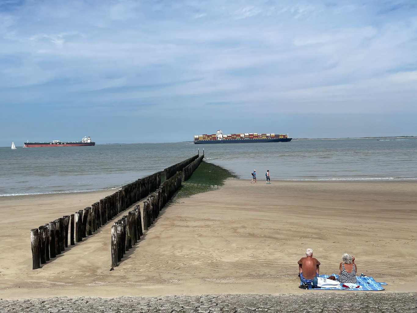 Old people sunbathing on a beach in Breskens, Zeeland