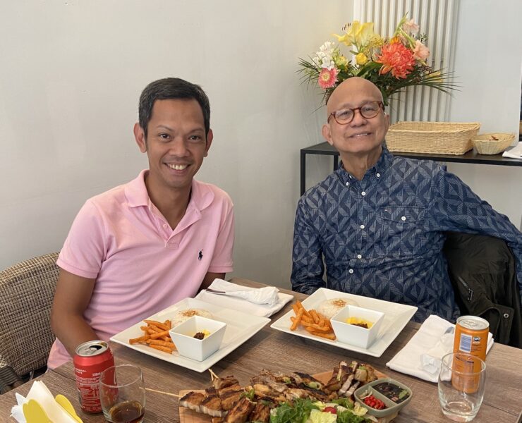 The author with retired professional dancer Rick Tuazon .
