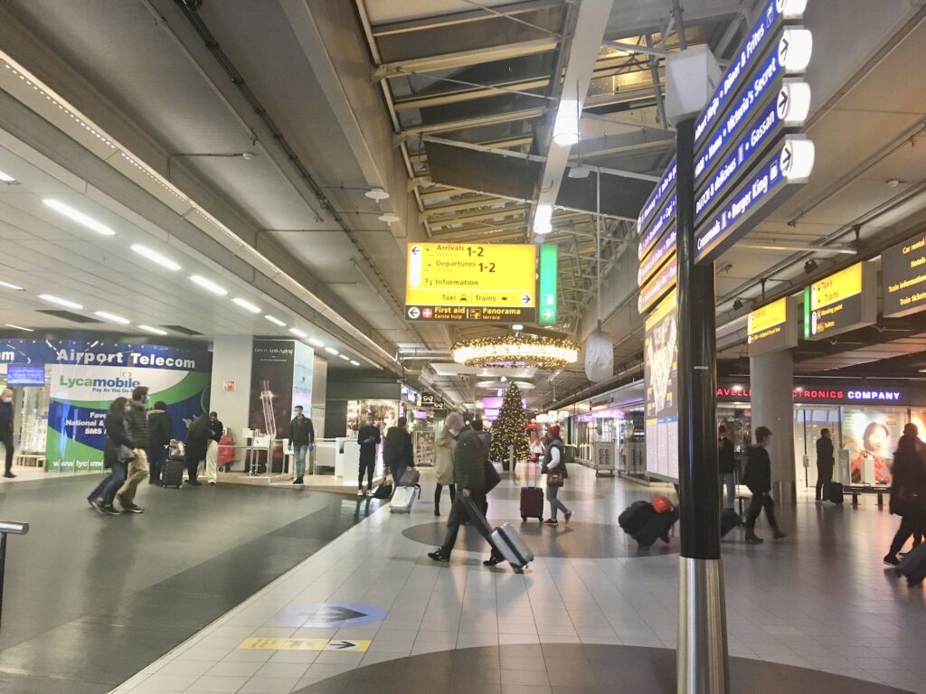 Travelers in Schiphol airport